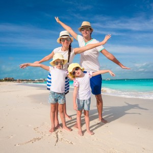 Family of four have fun on caribbean summer vacation