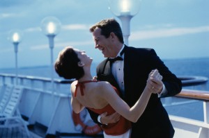 Mid adult couple dancing on the deck of a cruise ship