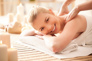 A female enjoying a relaxing back massage